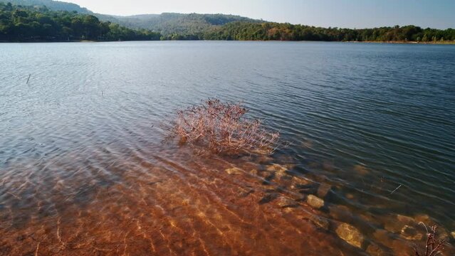 Reservoir view point Phu Pha Daen Forest Park with clear water and beautiful mountain background