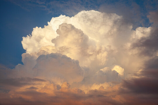 Majestic thunderhead clouds on a summer evening at sunset