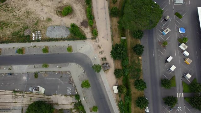 The long way to queue. Amazing aerial view flight bird's eye view tilt up drone footage at club Berghain Berlin Friedrichshain Summer 2022. Cinematic from above Tourist Guide by Philipp Marnitz