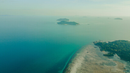 Naklejka na ściany i meble Aerial drone view of coastline scenery at Besar Island or Pulau Besar in Mersing, Johor, Malaysia
