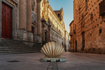 A shell, which is the symbol of the Camino de Santiago, in the streets of Salamanca in Spain. - obrazy, fototapety, plakaty
