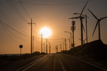 Fototapeta na wymiar a street with an ecstatic sunrise
