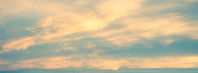 Soft image of sky in sunset with cloud. abstract nature background in retro color fillter effect.