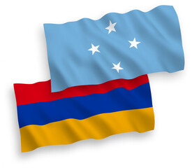 National vector fabric wave flags of Federated States of Micronesia and Armenia isolated on white background. 1 to 2 proportion.