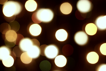 multicolored festive lights on a black background screensaver backdrop