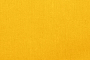 Yellow cotton fabric cloth texture background, seamless pattern of natural textile.