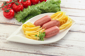 Mini sausages with pasta spaghetti