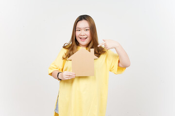 Holding Cutout House of Beautiful Asian Woman wearing yellow T-Shirt Isolated On White Background