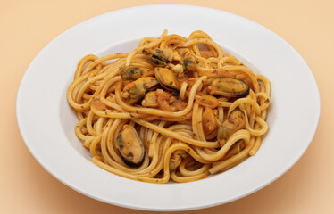 Italian Spaghetti with mussels and tomato soup isolated on clear background