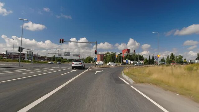 Driving POV as vehicle turns onto highway toward Kerava, Finland