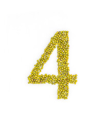 Number 4 made from mung beans. Green mung bean font. Alphabet made from green gram . White background. Dry green maash seeds.