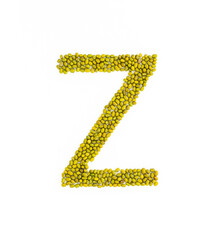Capital letter Z made from mung beans. Green mung bean font. Alphabet made from green gram . White background. Dry green maash seeds.