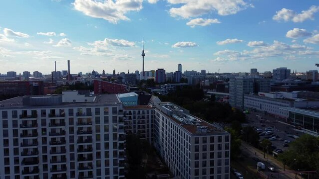 Luxury apartment directly on the river Spree.
Daring aerial view flight pedestal down drone footage of East Side Gallery Berlin Friedrichshain Summer day 2022. Cinematic from above by Philipp Marnitz