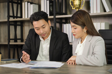 Business Asian people in formal outfit working together and brainstorming in modern office workplace.