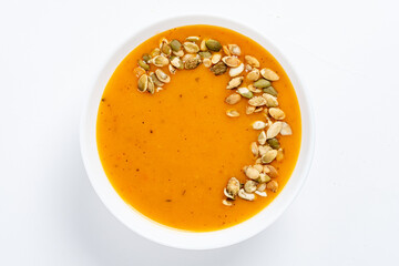 pumpkin cream soup on white