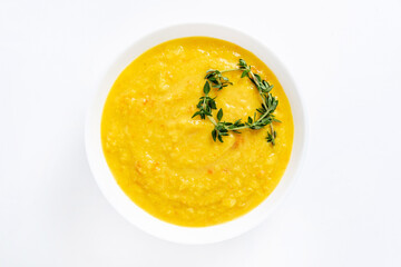 pumpkin cream soup on white