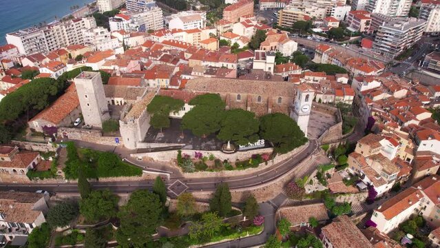 Cannes, France. Aerial View of Castle Chateau De La Castre, City Sign and Catholic Church Clock Tower, Hilltop Landmarks and Buildings, Drone Shot