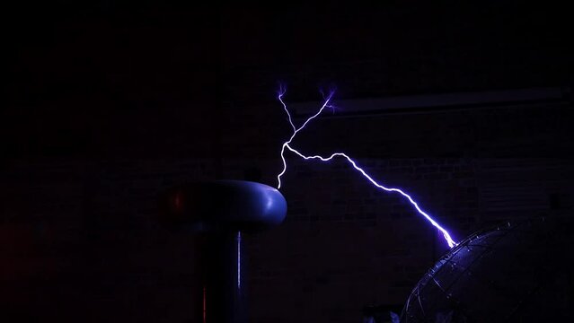 Tesla Coil arcs arcs and sparks with lightening discharge
