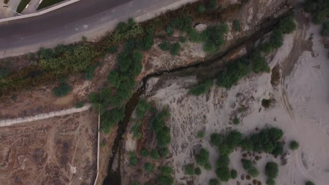 Aerial birdseye flying over building near Al Lith hot spring, Saudi Arabia