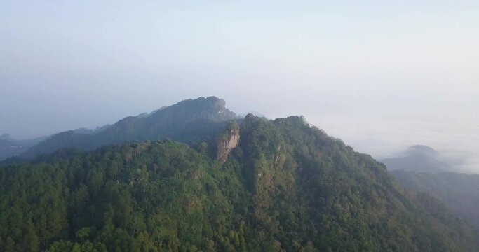 aerial view of forest and top of Menoreh Hill, Magelang, Indonesia. 4K stock nature videos. tropical rain forest.