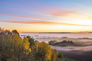 Dawn fog in the landscape in autumn