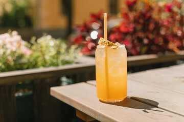 Glass of melon lemonade in a cafe outdoors. Summer drinks. - obrazy, fototapety, plakaty