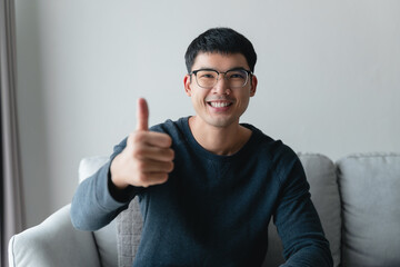 Happy Asian man thumbs up action, Positive, Good.