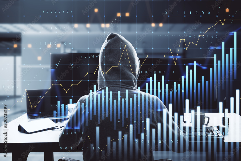 Aufkleber hacker in hoodie sitting at desktop and using laptop computer with abstract glowing and growing business graph hologram on blurry office interior background. 