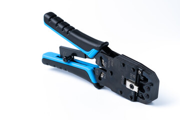 Crimp tool isolated on white background, use for twisted pair network cable with multiple RJ-45 connectors.