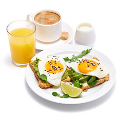 Fototapeta na wymiar sliced avocado and fried egg on toasted bread isolated on white background