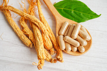 Ginseng roots and green leaf, healthy food.
