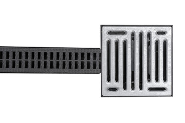 Iron drainage grate cover with black plastic yard ground gutter isolated on white.