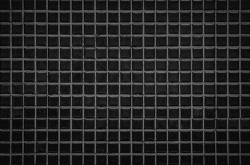 Dark black ceramic wall and floor tiles mosaic background in bathroom and kitchen. Design pattern geometric texture.