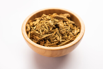 Ayurvedic Daruharidra - Daru haldi or tree turmeric isolated over white background