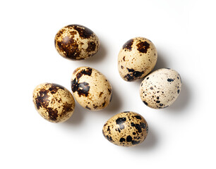 Obraz premium Quail eggs placed on a white background
