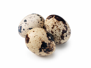 Obraz premium Quail eggs placed on a white background