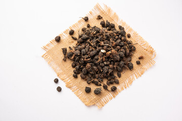 Ayurvedic Nagarmotha - Cyperus Scariosus or Cypriol in a bowl or heap
