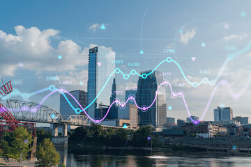 Panoramic skyline view of Broadway district of Nashville over Cumberland River at day time, Tennessee, USA. Forex graph hologram. The concept of internet trading, brokerage and fundamental analysis