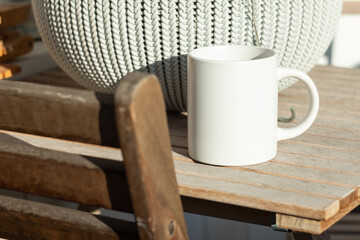 White mug on the table - 520752152