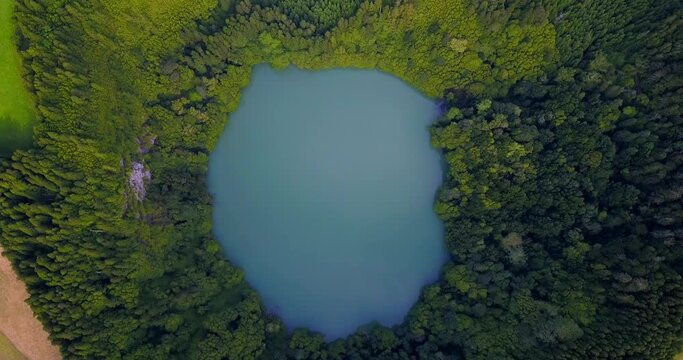 Lagoa do Congro bird eye vertical 4k drone view. High quality video of a lake in Azores islands