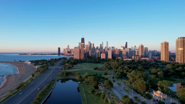 Sunrise Drone Environmental Friendly City Park Next To Waterfront With Downtown Skyline