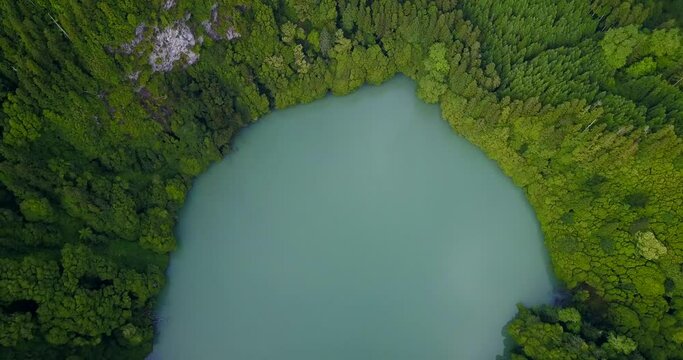 Lagoa do Congro bird eye vertical 4k drone view. High quality video of a lake in Azores islands