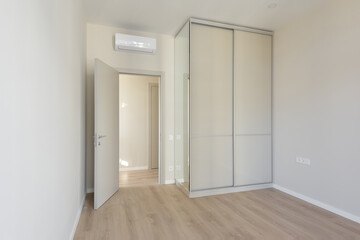 empty white room with a wardrobe, modern interior