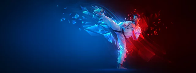 Tuinposter Collage with active young man, karate fighter in white kimono in action, motion isolated on blue-red background with neoned elements. Sport, ad concept © master1305