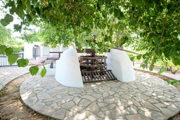 noria junto a la Iglesia de Jesús,. construida en el siglo XV, pueblo de Jesus, Ibiza, balearic islands, Spain