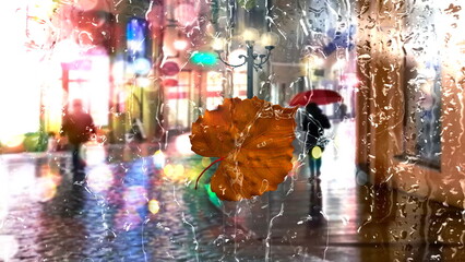 rain in city,yellow leaves and  rain drops on wet  window glass ,Rainy weather, pedestrian with umbrella ,  bokeh bluured night city light  ,Autumn season background template banner 