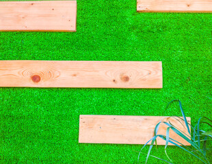 Wood texture light yellow boards, bright green, hanging on wall, for design background, vintage, mockup template Blank copy space Empty, frames, horizontal lines, narrow several planks elements 