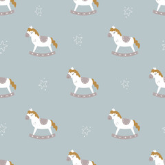 Christmas seamless pattern with childish rocking horses.