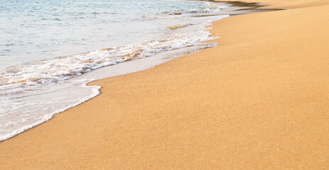 Closeup brown sandy beach background, nature bacakground, banner style