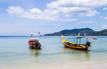 Wooden boat at the beach in south of Thailand, travel by boat, summer outdoor day light, vertical style
